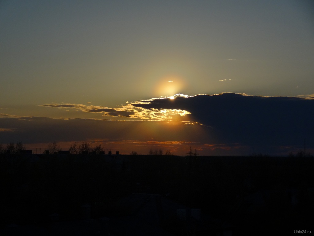 Солнце село в облаках фото